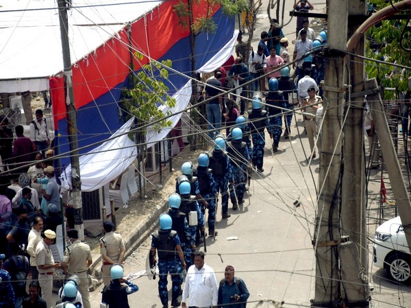 Rapid Action Force and police personnel patrolled the site on Sunday where violence broke out between two communities in Jahangirpuri (Photo/ANI)