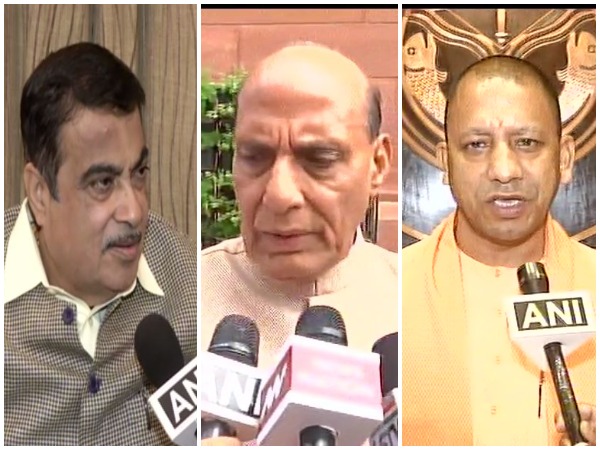 Road Transport and Highway Minister Nitin Gadkari (left), Defence Minister Rajnath Singh (middle) and Uttar Pradesh Chief Minister Yogi Adityanath (right)