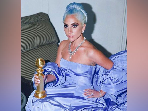 
    Lady Gaga's Golden Globe Award gown is going up for auction
    