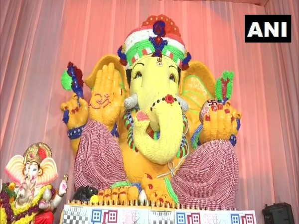 Ganesha idol made up of dice, chess pieces and coins at Hyderabad
