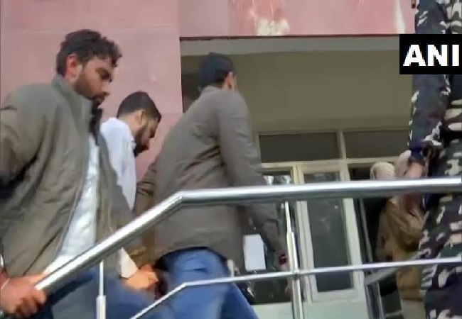 Gangster Sukhpreet Singh Dhaliwal in white shirt produced before court in Mohali, Punjab 