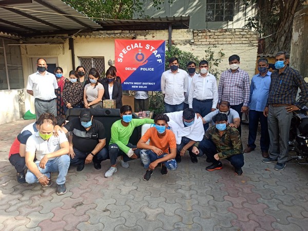 Visual of accused taken into poliuce custody for gambling.