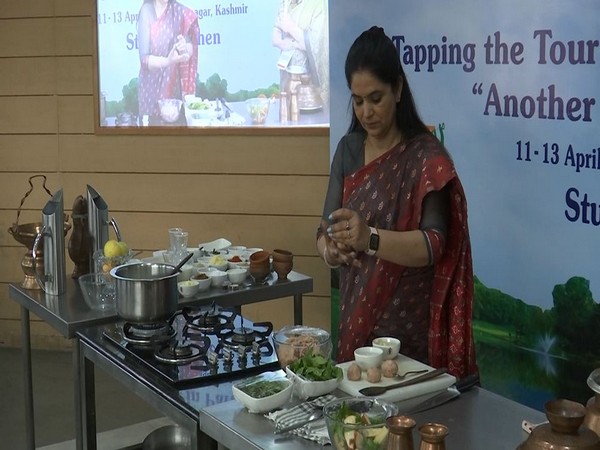 Visual of Pankaj Bhadouria giving a live demonstration of her cooking skills in Kashmiri cuisine