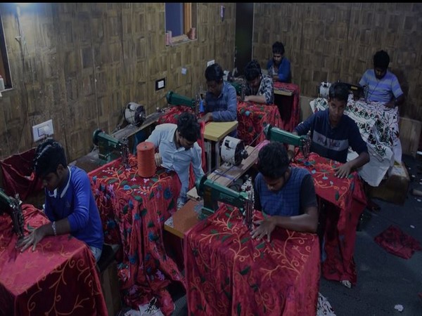 People employed under Nasreena Akhter making embroidered items (Photo/ANI)
