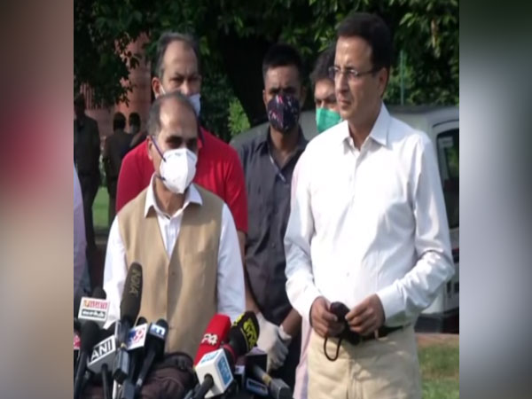 Congress leaders Adhir Ranjan Chowdhury (left) and Randeep Singh Surjewala addressing media persons in New Delhi on Tuesday. [Photo/ANI]