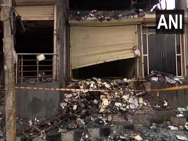 Today morning visuals from the spot where a massive fire broke out in a building yesterday, May 13 (Photo/ANI)