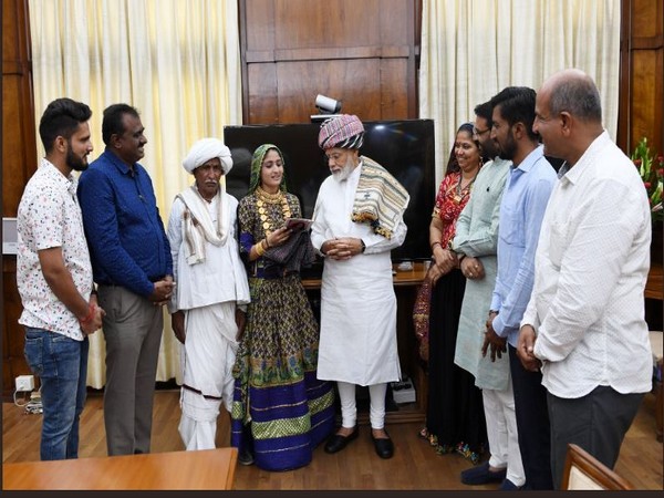 PM Modi meets Gujarati folk singer Geeta Rabari on Monday. Photo/ANI