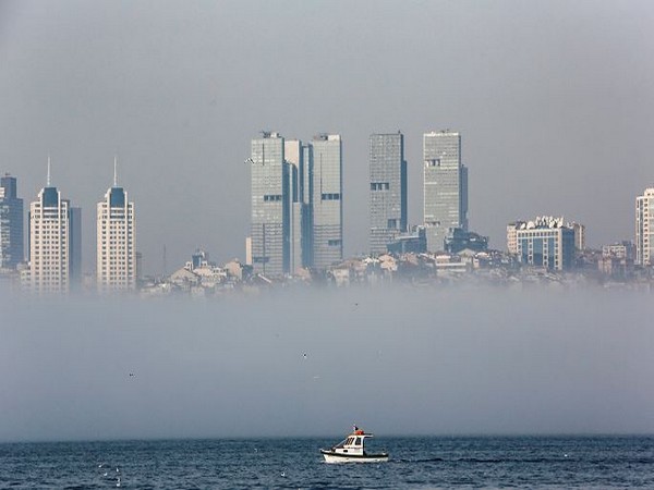 A boat sails through the Bosphorus strait during a foggy day in Istanbul, Turkey (Photo Credit: Reuters)