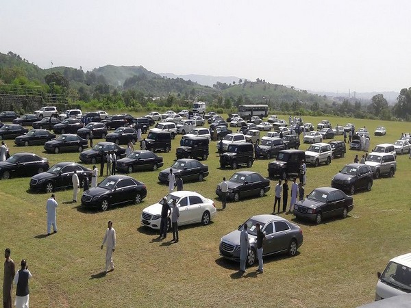People visit an auction of government owned used cars at the premises of Prime Minister House in Islamabad, Pakistan September 17, 2018 (Photo Credit: Reuters)