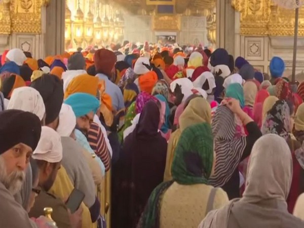 Devotees at Golden Temple in Amritsar on the occasion of Holi. 