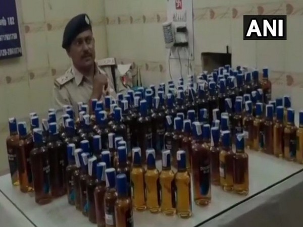 128 bottles of illicit liquor seized at Ghaziabad railway station in Uttar Pradesh on Tuesday. Photo/ANI