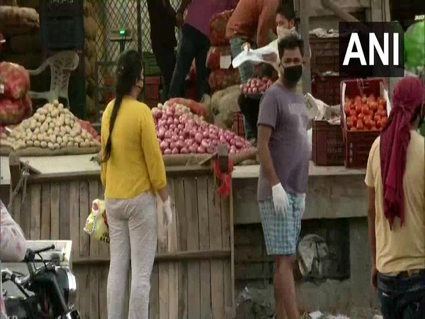 Social distancing observed at Ghazipur fruit and vegetable market amid COVID-19 outbreak. Photo/ ANI