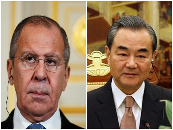 Russian Foreign Minister Sergey Lavrov and his Chinese counterpart, Wang Yi,