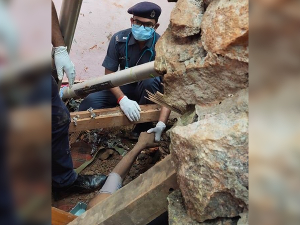 NDRF rescues man trapped under heavy concrete boulder in a landslide incident in Guwahati, Assam. 