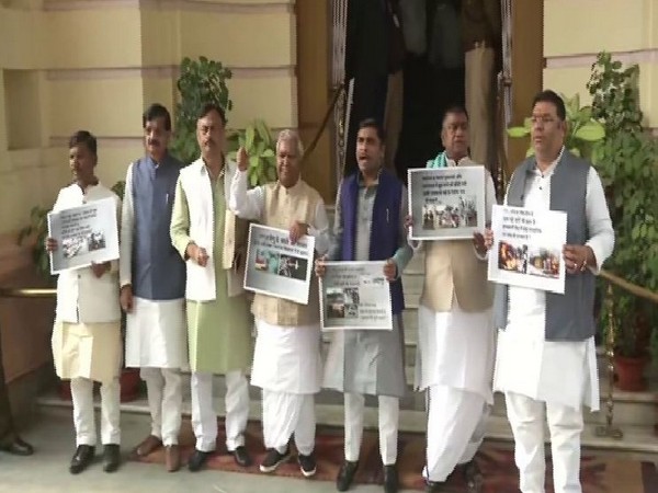 RJD leader Ramchandra Purvey (fourth from the right) staged protest in Bihar Assembly premises on Tuesday in Patna. Photo/ANI