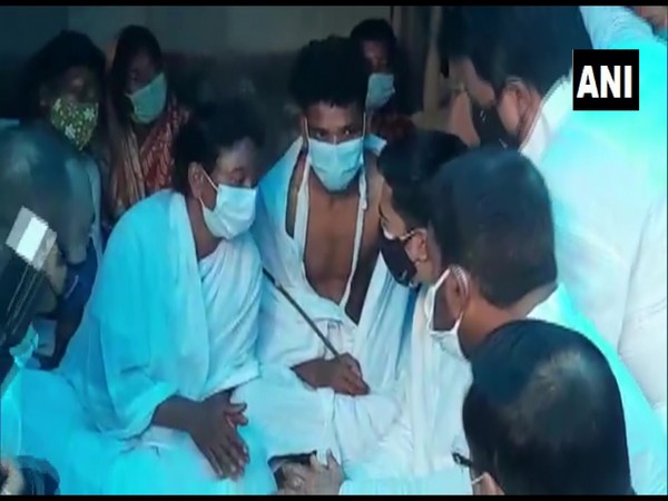 TMC leader Abhishek Banerjee meeting a lightning victim's family (ANI).