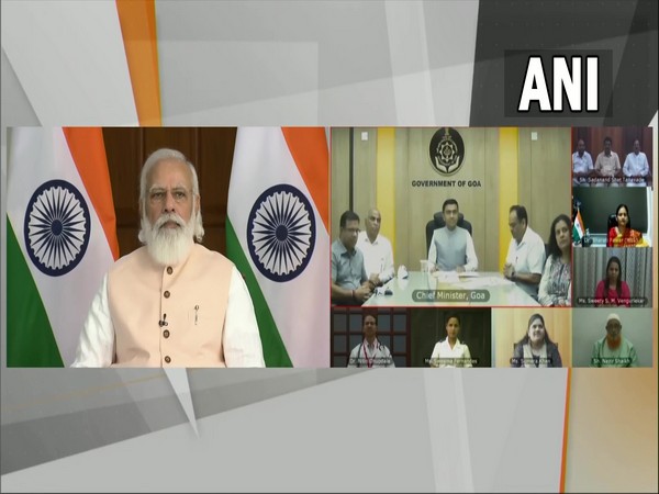 Prime Minister Narendra Modi interacts with the healthcare workers and vaccine beneficiaries of Goa. (Photo/ANI)