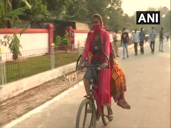 A first-time voter with her grandmother arriving at a polling booth in Patna. [Photo/ANI] 