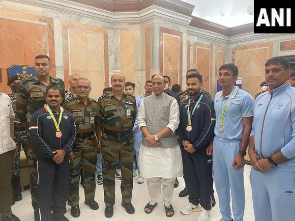 Rajnath Singh with 2022 Commonwealth Games medalists, participants of Armed Forces. (ANI/photo)