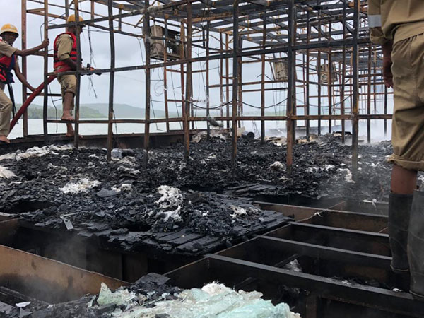 Fire fighters in the Bar ca De Festa houseboat on Friday in North Goa. Photo/ANI