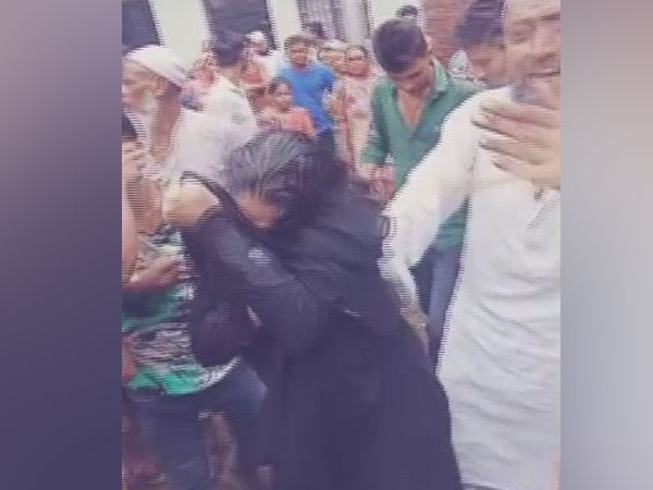 A woman was thrashed by an angry mob on suspicion of child lifting. Photo/ANI