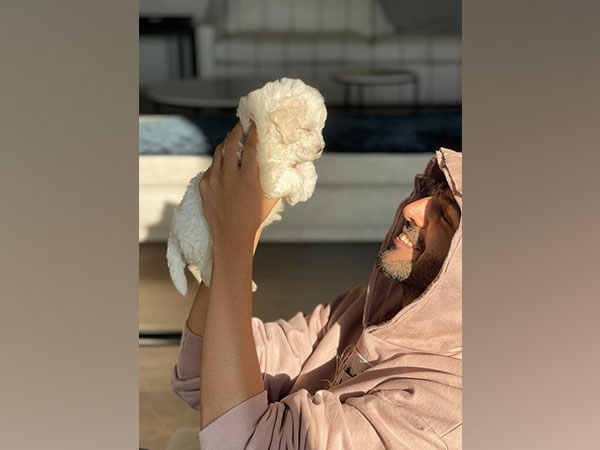 Kartik Aaryan with his dog (Image source: Instagram)