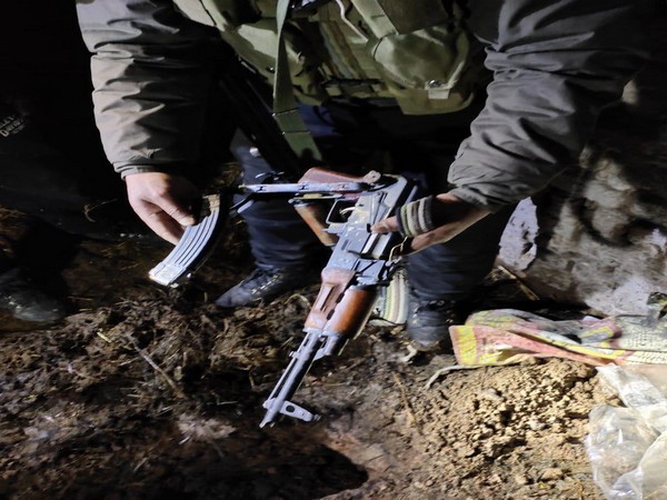 Arms recovered by the Shopian police and Indian Army during a raid at detained Irfan Ahmed Kuttey's house in Chotipora Sedow