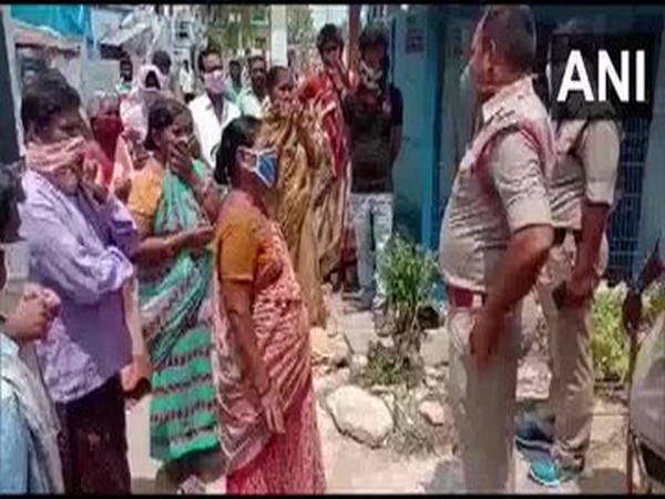 Villagers protesting against selling of liquor in Guntur, Andhra Pradesh.
