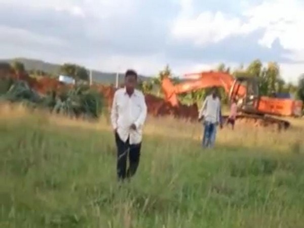 A visual from the incident where Reddy threatened contractor aides over the construction of canal on his land. (Photo/ANI)