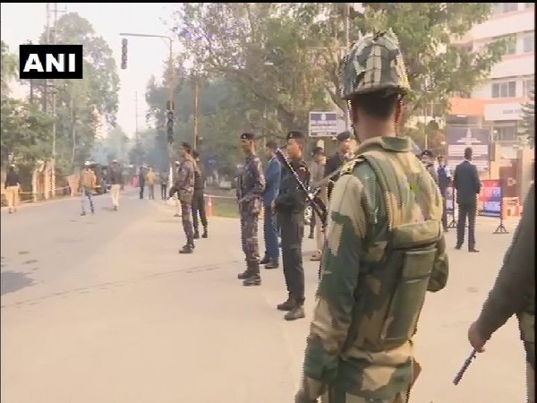 Security personnel stand guard in Guwahati, Assam on Sunday. 