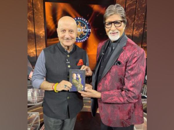 Anupam Kher with Amitabh Bachchan on the sets of Kaun Banega Crorepati