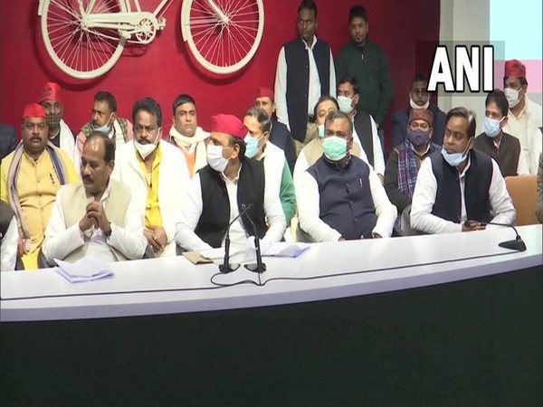 Samajwadi Party leaders with party chief Akhilesh Yadav (Photo/ANI)