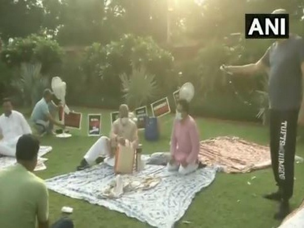 Rajya Sabha Deputy Chairman Harivansh with suspended MPs at parliament premises on Tuesday. (Photo/ANI)