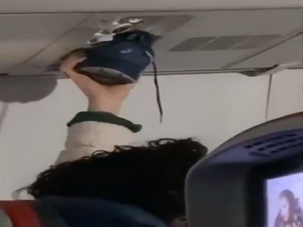 The passenger probably stank up the whole cabin just to dry the seemingly wet and filthy shoe (Picture Courtesy: Instagram)