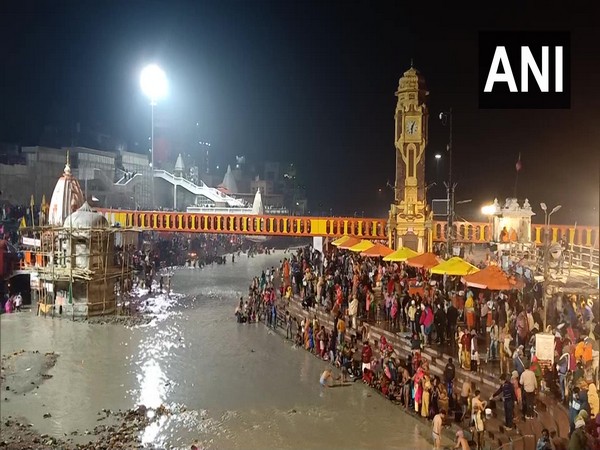 Devotees took a holy dip in river Ganga in Haridwar on 'Mauni Amavasya'. (Photo/ ANI)