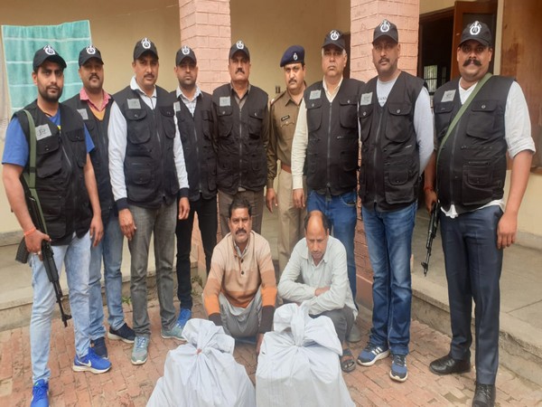 The arrested accused in police custody along seized over 66K banned tablets and 40 boxes of illicit liquor. Photo/ANI