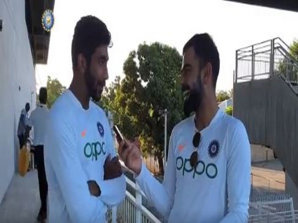 India skipper Virat Kohli in conversation with Jasprit Bumrah (Photo/BCCI Twitter)