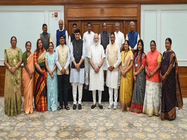 PM Modi meets district Panchayat Members from Gujarat. (Photo/PMO India)