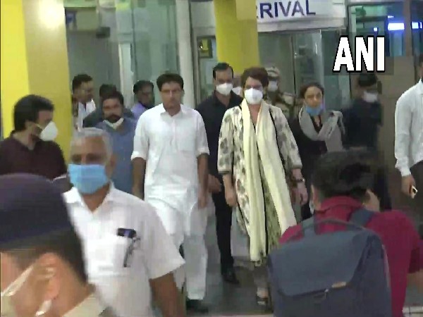 Congress General Secretary Priyanka Gandhi Vadra (in cream coloured outfit) arrives in Lucknow (Photo/ANI)