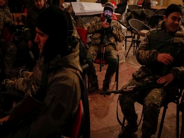 Members of the Ukrainian Territorial Defence Forces are seen in Kyiv, Ukraine (Photo Credit: Reuters)