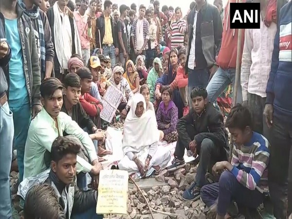 Protestors block railway track at Hathras Junction railway station (Photo/ANI)