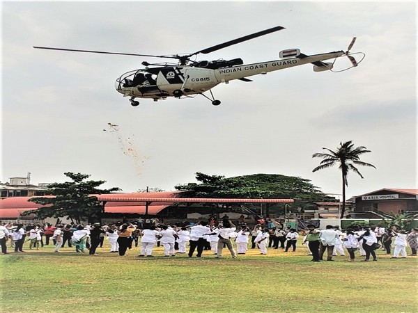 A Coast Guard helicopter showering petals on Sunday. 