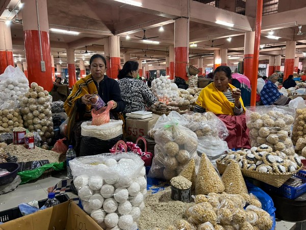 Women selling goods in Manipur's Imam market 