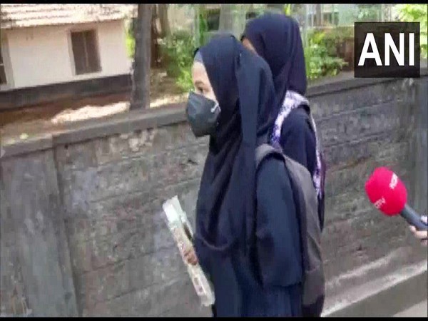 Two students, who are fighting a legal battle for the hijab, leave the PUC examination centre after they were allegedly not permitted to take the exam wearing hijab (Photo/ANI)