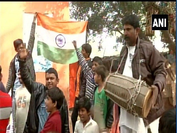 Hindu refugees from Pakistan celebrating the passage of Citizenship (Amendment) Bill in New Delhi on Tuesday.