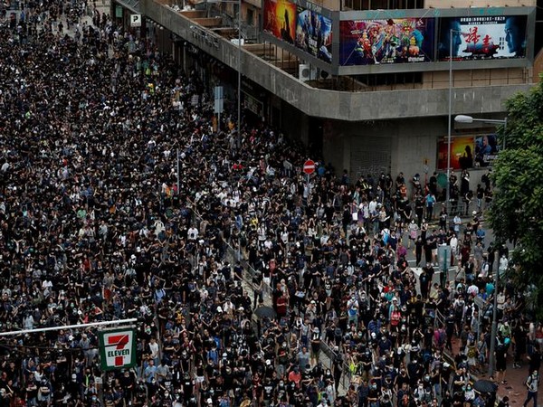 Anti-extradition bill protesters march in Mong Kok, Hong Kong on August 3. (Photo/Reuters)