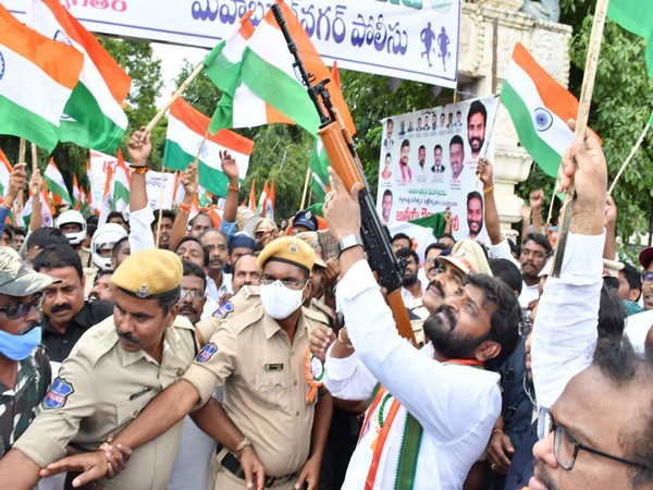 Telangana Minister opens fire from police gun at a public rally (Photo/Twiiter id of Srinivas Goud)