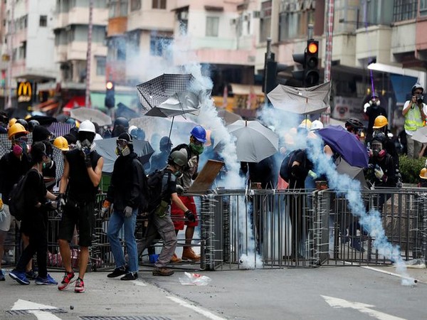 Police fired tear gas at the black-clad protestors who had occupied the main thoroughfare of Cheung Sha Wan Road in Sham Shui Po district on Sunday.