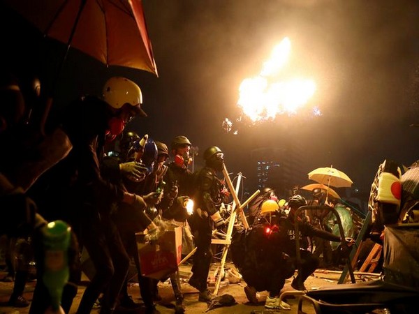 Clashes broke out between riot police and protesters at the Polytechnic University in Hong Kong on Sunday