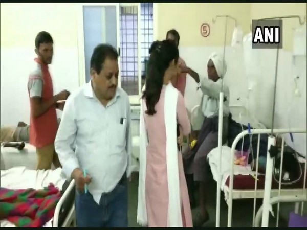 The family of Ratan Kumar admitted in the hospital following complaints of vomiting and diarrhoea in Barwani, Madhya Pradesh on Tuesday. (Photo/ANI)